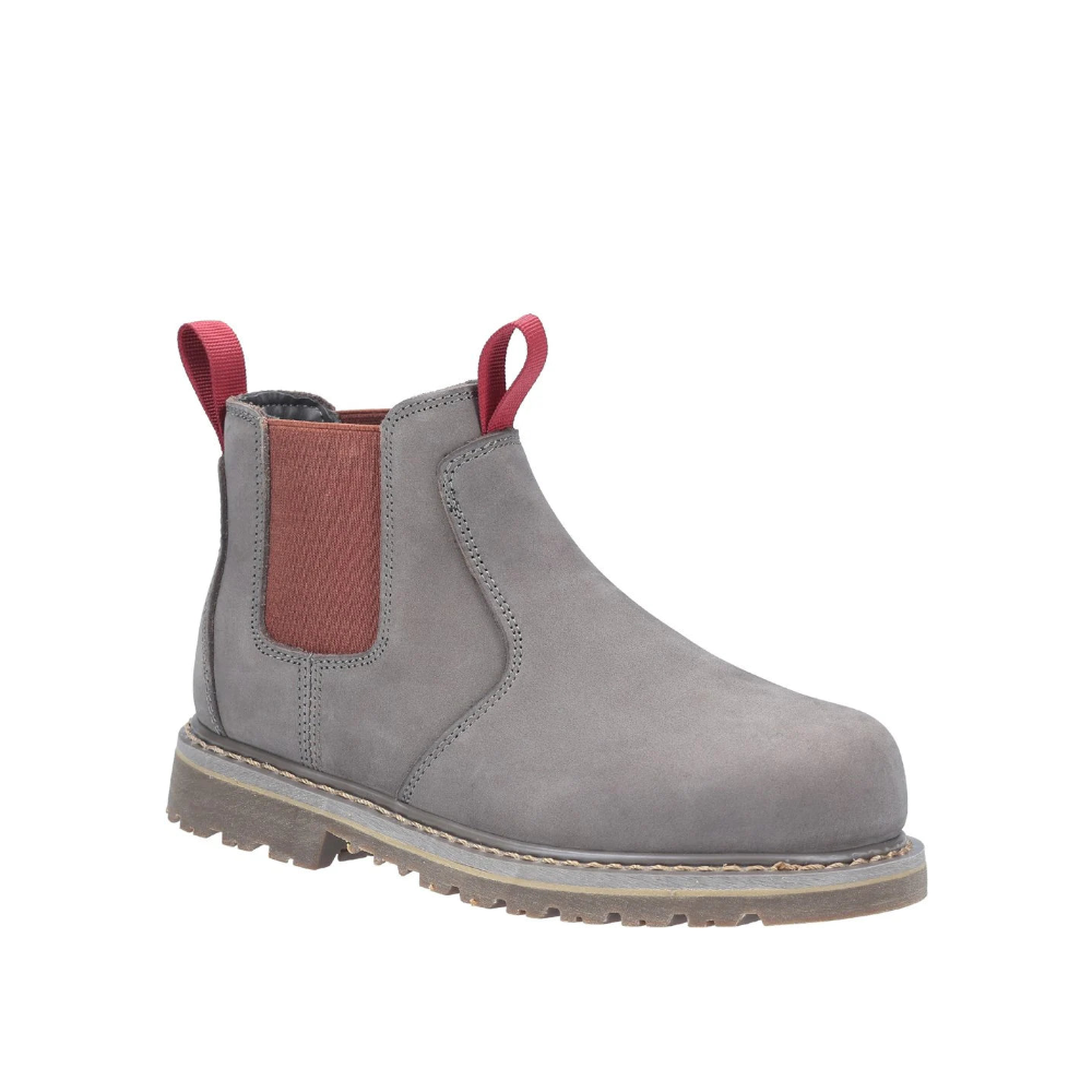Gray Chelsea boot with red pull handles on a white background