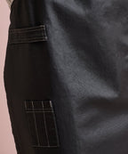 District waxed-look denim bib apron