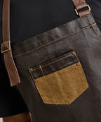 Division waxed-look denim bib apron with faux leather